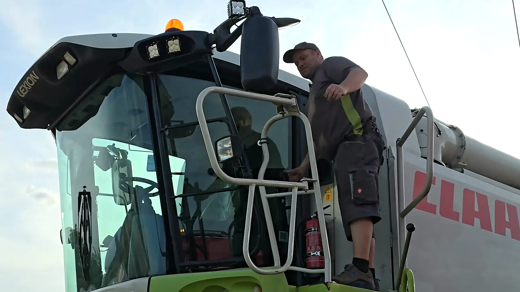 Christian Peschel on a CLAAS harvester